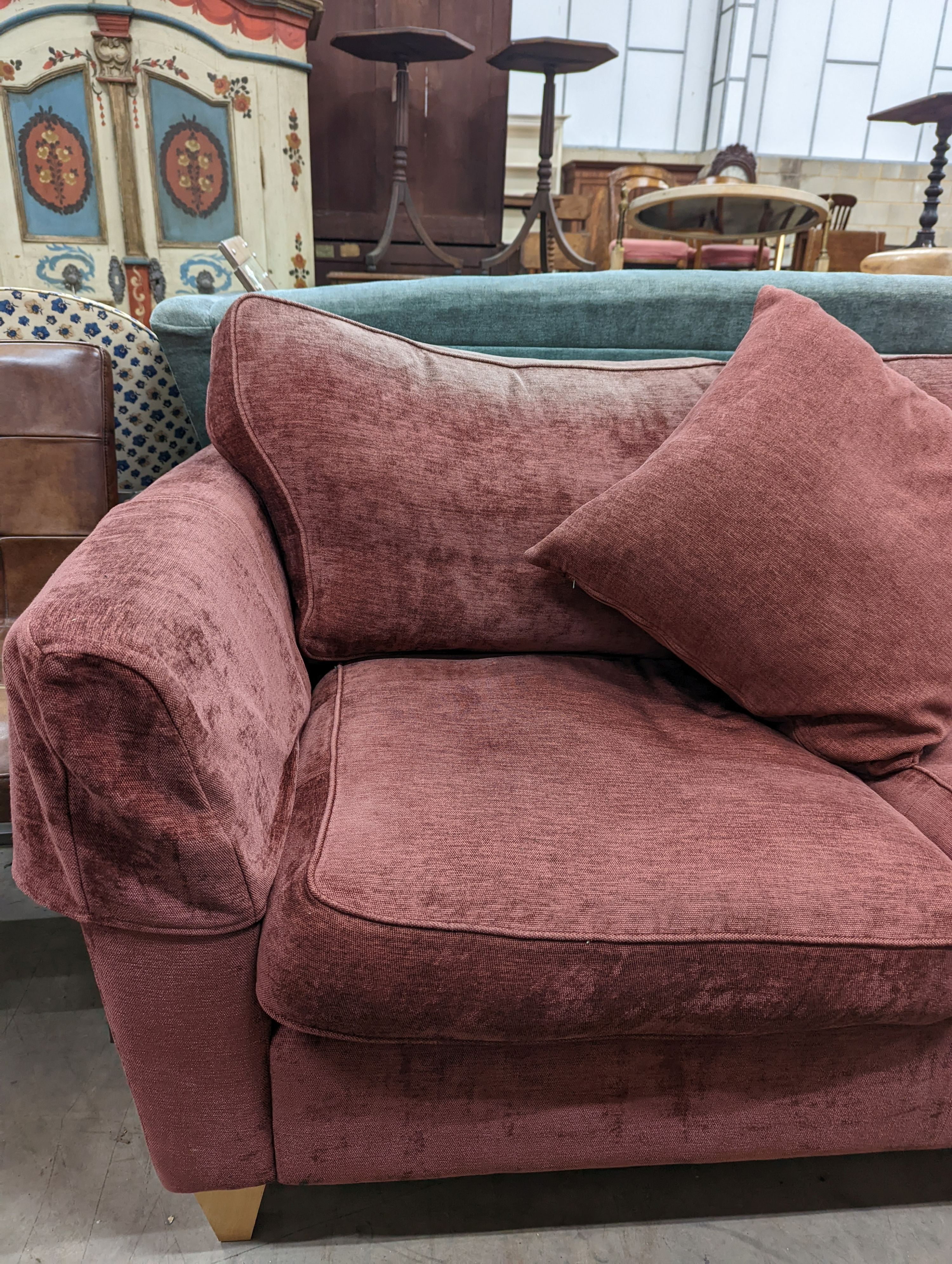 A contemporary plum fabric two seater settee, length 176cm, depth 84cm, height 86cm